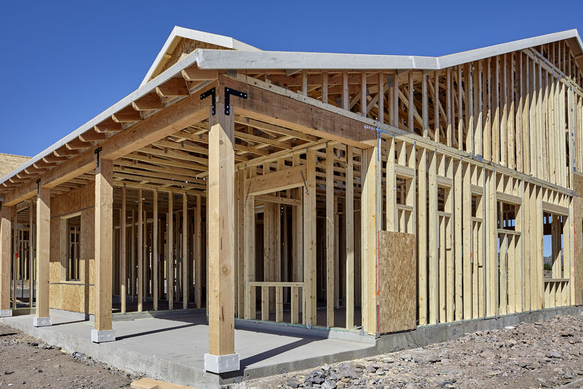56976080_m 56976080 - new housing wood frame construction industry concept photograph of economic recovery